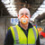 Man in warehouse wearing Alpha Solway Alpha Flow AMF-3V mask