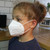 young child wearing white Childrens FFP3 Face Mask  with Ear Loops